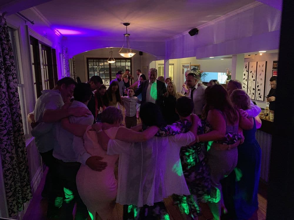 Huka Falls Resort - Wedding guests dancing