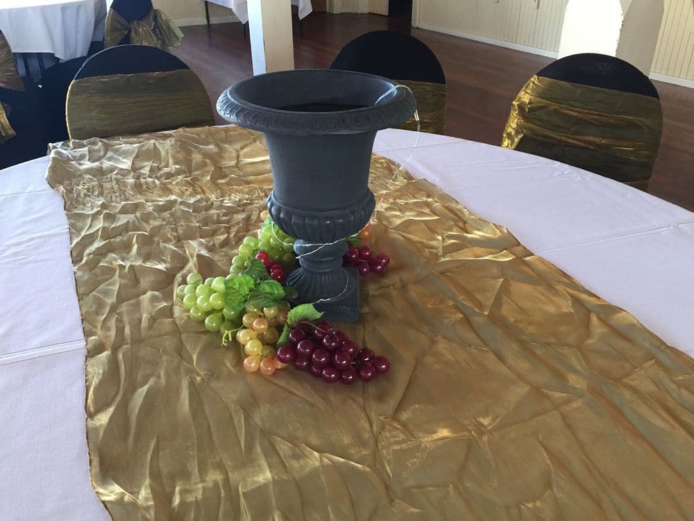 Hawkes Bay Racing Centre - Table Centre Piece Black Vase with Grapes for Ancient Greece Theme