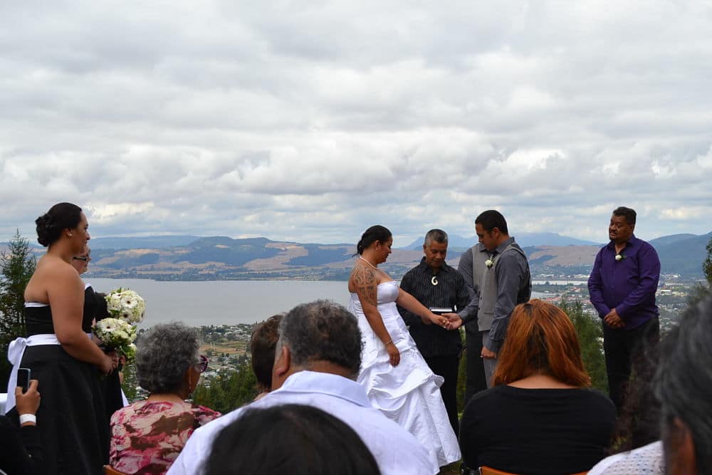 Skyline Rotorua Hidden Forest Venue - Wedding ceremony with celebrant and couple