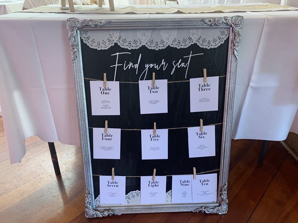 Find your seat - Table setting board set up at Newbury Hall Palmerston North