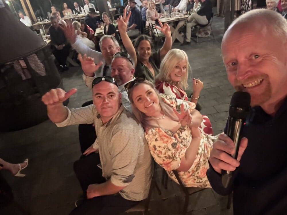DJ Kris Nielson-Wedding MC taking selfie at wedding with guests playing -Scavenger hunt